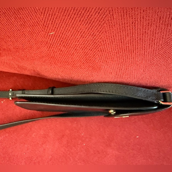 Kate Spade ns flap phone cross body purse. NWOT, black. Adjustable strap. - Picture 5 of 6